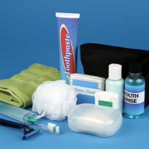 Personal care items like sunscreen, insect repellent, and hygiene essentials for a motorcycle journey